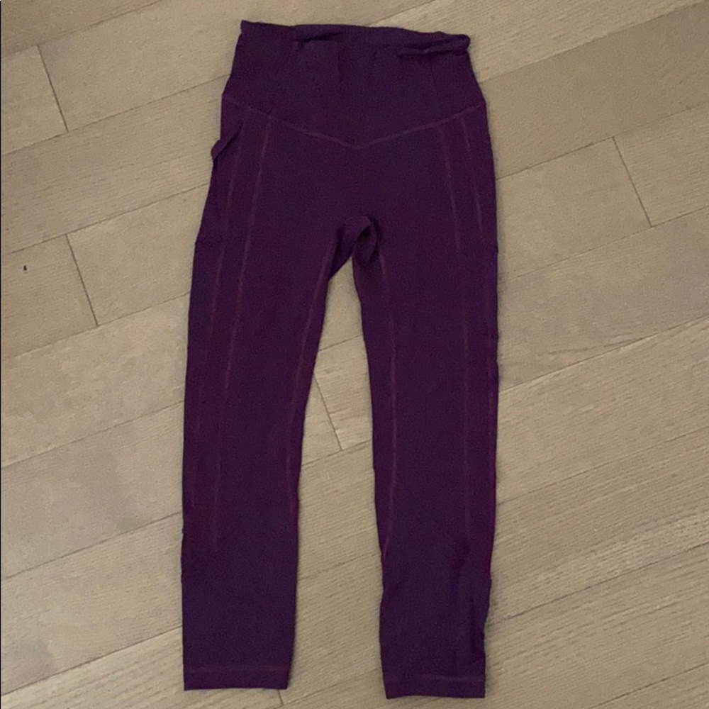 Plum high rise Lululemon leggings with side pocket